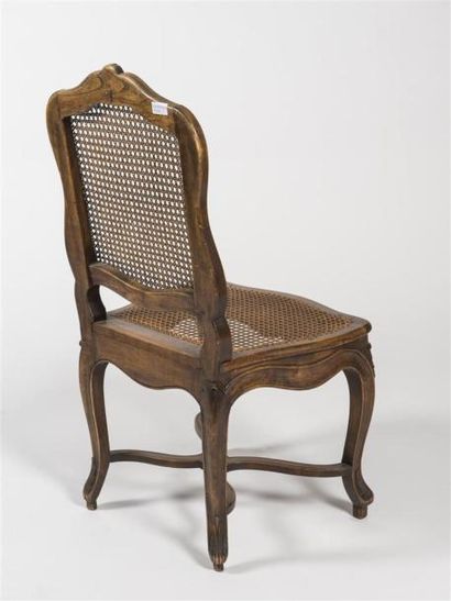 null Suite de neuf chaises à dossier droit à fond de canne
Epoque Louis XV
(fèle...