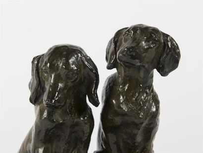 null G MARGARITY (20ème siècle) & SUSSES FRERES
Paire de serre-livres chiens en bronze...