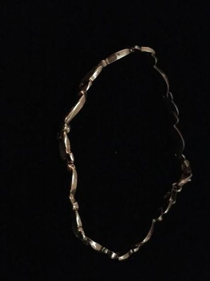null Vendu débris : Bracelet en or (585) 14K à maillons croix et serpent Poids :...
