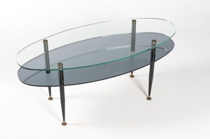 null Travail 1950
Table basse à double plateaux en verre transparent et opalin noir...