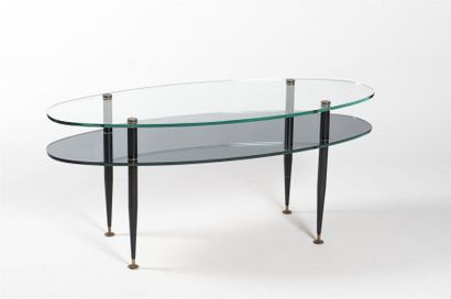 null Travail 1950
Table basse à double plateaux en verre transparent et opalin noir...