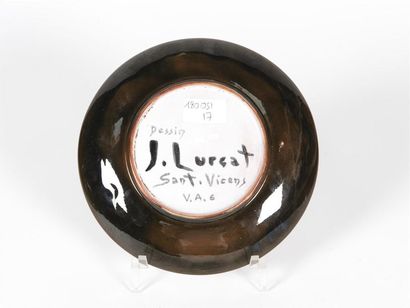 null Jean LURCAT (1894-1970)
Assiette à émaillage polychrome à décor d'un profil...