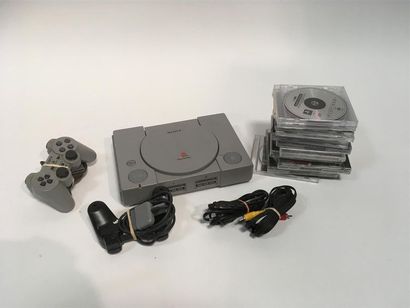 null Playstation 1 (pack comprenant deux manettes, câbles et 12 jeux dont V Rally,...