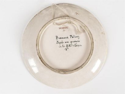 null Théodore DECK (1823-1891) 
Rare plat circulaire en faïence émaillée polychrome...