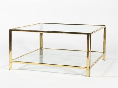 null Travail 1980
Table basse à double plateaux en verre à structure en métal doré
H:...