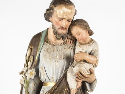null Saint Joseph et l'Enfant Jésus 
Sculpture en plâtre patiné polychrome
19ème...