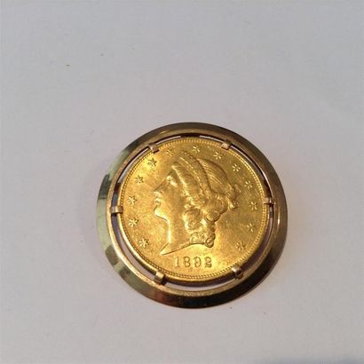 null Pendentif ou broche en or jaune (750) 18K, pièce de 20$ américain 1892.
Poinçon...