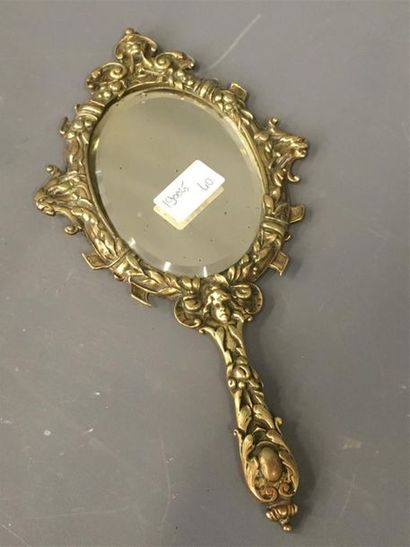 null Miroir en bronze 
H. 31 cm 