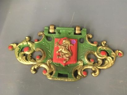 null Plaque armoiries en bronze peinte à décor de lion 
19x37 cm