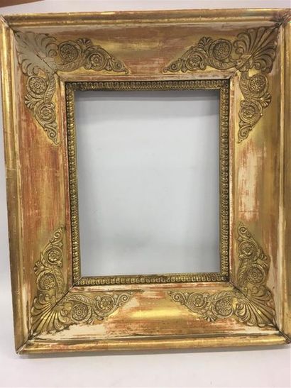 null Un cadre en bois doré décor de palmettes
Dimension intérieure : 39 x 29 cm
