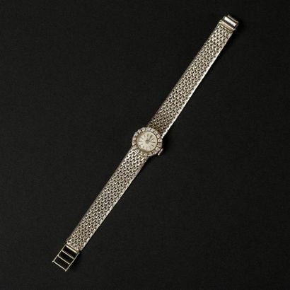 null ELITAM. Montre de dame en or blanc (750) 18K. Boîtier et bracelet en or, lunette...