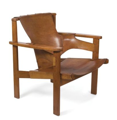 null Fauteuil en teck avec assise et dossier en cuir de couleur havane. Travail scandinave,...