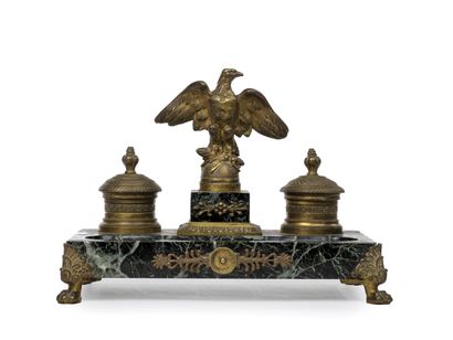 null 1st Empire. Desk set in patinated bronze. With two inkwells, in the center the...