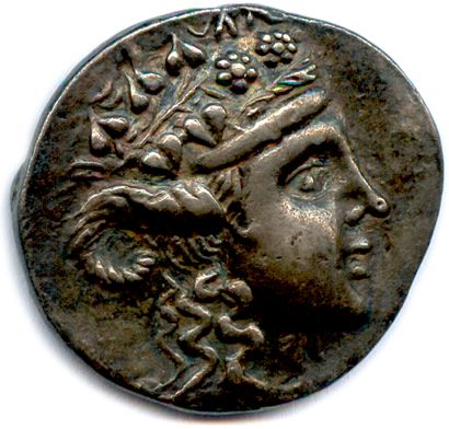 null ISLAND OF THRACE - THASOS 140-110

Head of Dionysus crowned with vine leaf and...