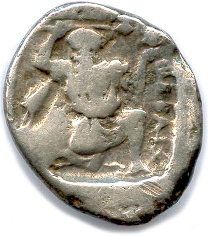 null BOEOTIA - THEBES 450-400

Boeotian shield. R/. Dionysus half-kneeling holding...