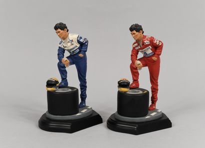 null Set of 2 statuettes in resin with the effigy of Ayrton Senna under the colors...