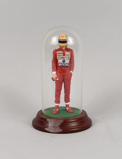 null Ayrton Senna. Figurine with the effigy of the pilot under the colors of the...