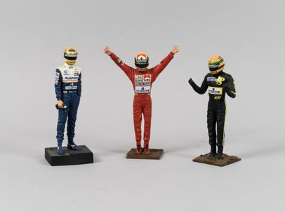 null Set of 3 resin figurines featuring Ayrton Senna in the colors of the Lotus,...