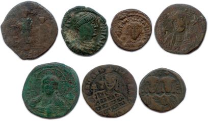 null Seven Byzantine bronze coins: 

Focas and Leontia, Justinian I, Constantine...