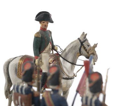 null Métayer. The Emperor in Chasseurs à cheval uniform, salutes the flag of the...
