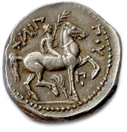 null ROYAUME DE MACÉDOINE - PHILIPPE II 359-336

Tête laurée de Zeus à droite. R/....
