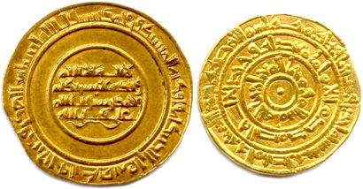 null THE FATIMIDS 

Two gold coins, Fatimid dinar of the 10th-11th centuries. : 

Dinar...