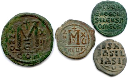 null Four Byzantine coins: 

Follis and half-follis in bronze of Justinian I (527-565)...