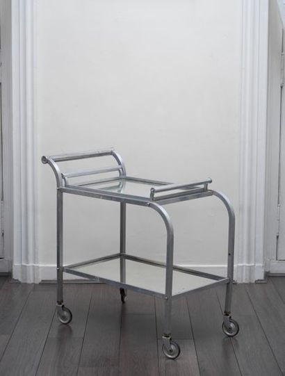 JACQUES ADNET Jacques ADNET (1900-1984) -

table on wheels

Chrome-plated metal square...