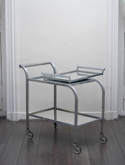 JACQUES ADNET Jacques ADNET (1900-1984) -

table on wheels

Chrome-plated metal square...