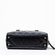 Chanel CHANEL - Woman's bowling bag in black matte patent calfskin with stitching...