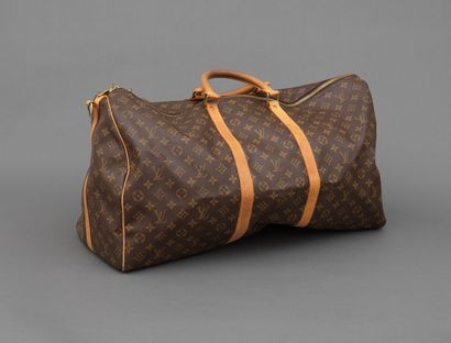 Louis Vuitton LOUIS VUITTON- Sac de voyage keepall 60 cm en toile monogram et cuir...