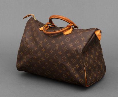 Louis Vuitton LOUIS VUITTON - Sac à main speedy 35cm en toile monogramme et cuir...
