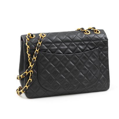 Chanel CHANEL - Classic bag with maxi jumbo flap in black lambskin - Inside in red...