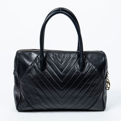 Chanel 
CHANEL - Black lambskin handbag, rectangle shape with herringbone pattern...