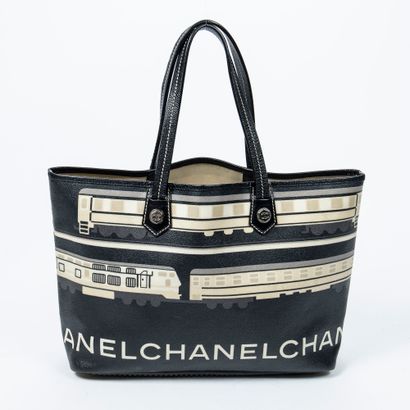 Chanel 
CHANEL - Canvas bag decorated with trains and the logo of the brand - Beige...