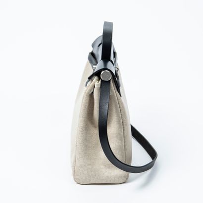 Hermès HERMES - HerBag in H and raw canvas with an interchangeable black canvas pouch...
