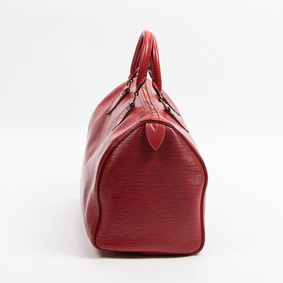Louis Vuitton LOUIS VUITTON -Sac Speedy 30 en cuir épi rouge – Bon état, usures aux...