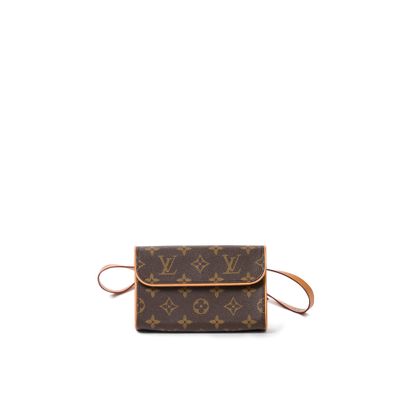 Louis Vuitton LOUIS VUITTON - Belt pouch in monogrammed canvas and natural cowhide...