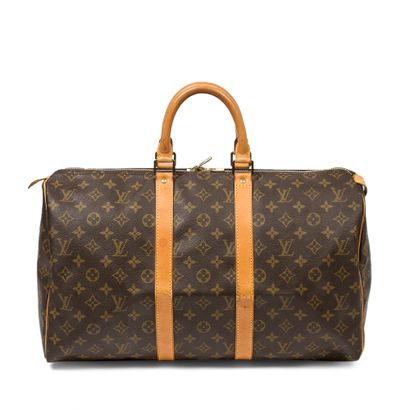 Louis Vuitton LOUIS VUITTON- Keepall 45 bag - in monogrammed canvas and natural leather...