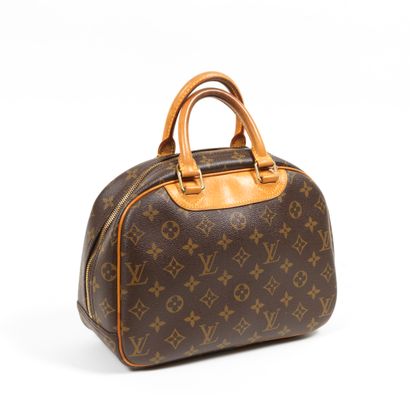 Louis Vuitton LOUIS VUITTON -Trouville bag in monogram canvas and natural cowhide...
