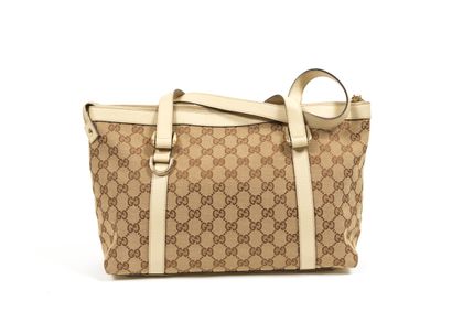 Gucci GUCCI - Tote bag in beige monogrammed woven canvas and ecru grained leather...