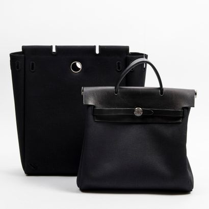 Hermès HERMES - Herbag model backpack in black leather, delivered with two black...