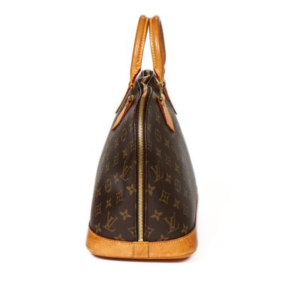 Louis Vuitton LOUIS VUITTON - Medium size Alma bag - in monogrammed canvas and natural...