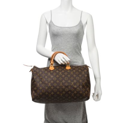 Louis Vuitton LOUIS VUITTON - Speedy 40 bag - in monogrammed canvas and natural leather...