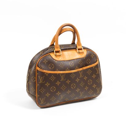 Louis Vuitton LOUIS VUITTON -Trouville bag in monogram canvas and natural cowhide...