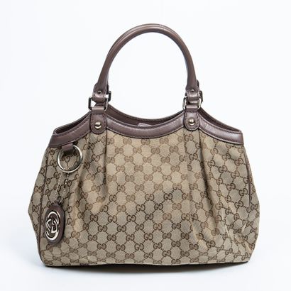 Gucci GUCCI - Hand or shoulder bag in beige monogrammed woven canvas and smooth tea...