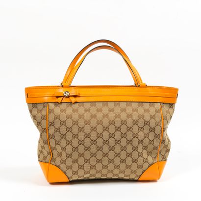 GUCCI GUCCI - Hand or shoulder bag in monogrammed woven canvas and smooth orange...