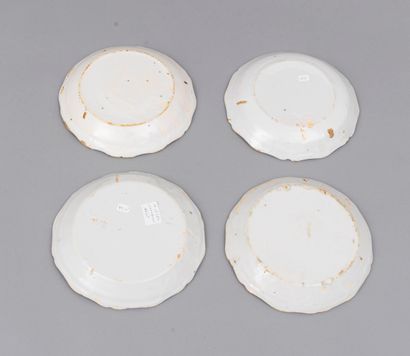CERAMIQUE 
Nevers

Four earthenware plates with contoured edges, with polychrome...
