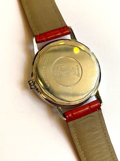 Lip Lip Genève, vers 1960 - Une montre vintage en acier, cadran argent rayonnant,...