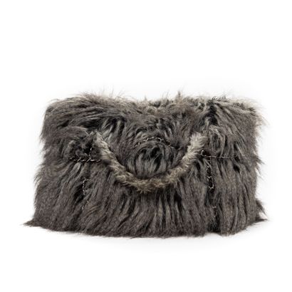 CHANEL CHANEL Paris oversized handbag in synthetic fur and black lambskin - black...